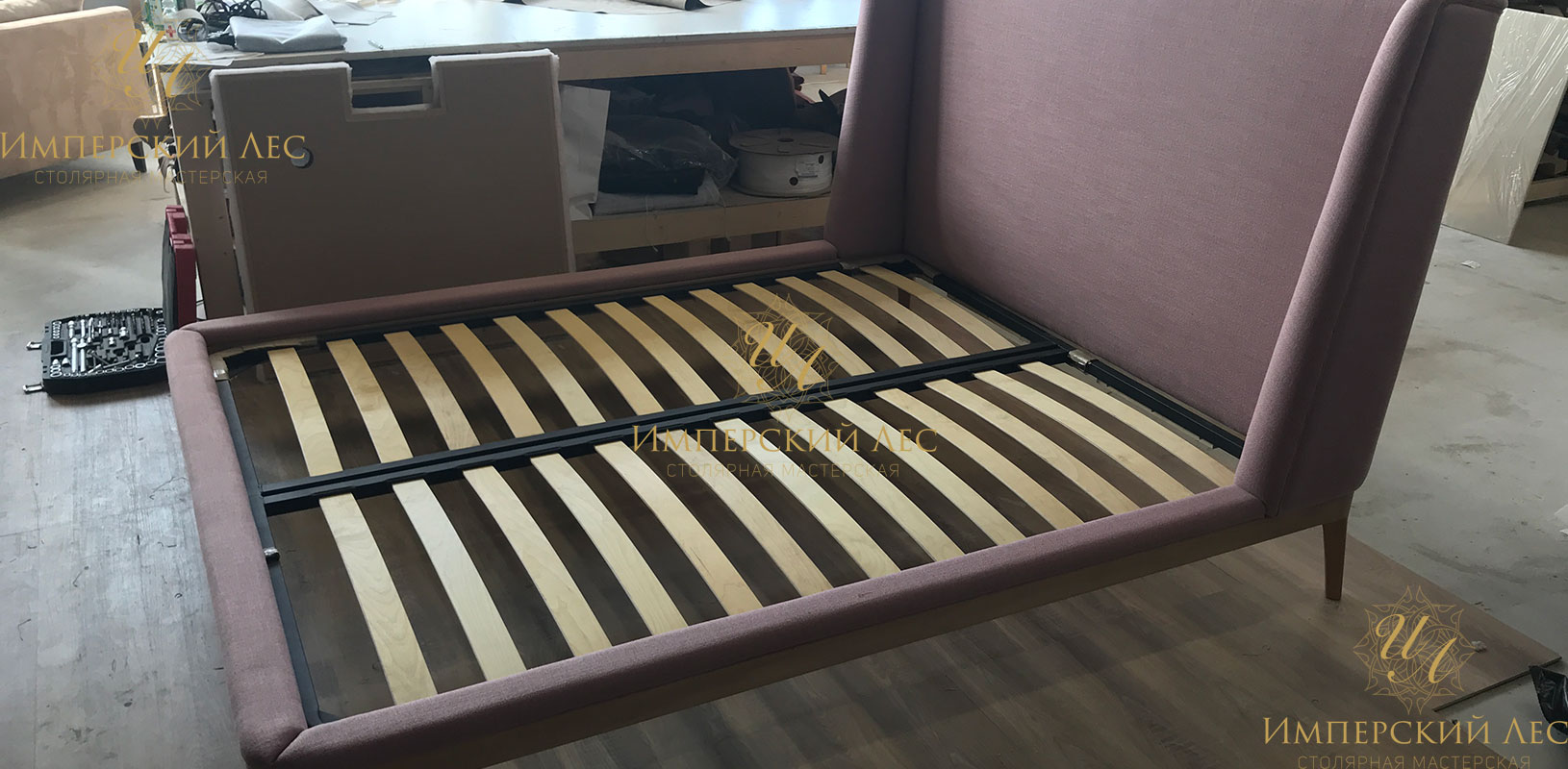 Кровать "Глория" из натурального дерева с обивкой фиолетового цвета